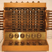 Wilhelm Schickard creates a gear-based, wooden, six-digit, mechanical adding machine.